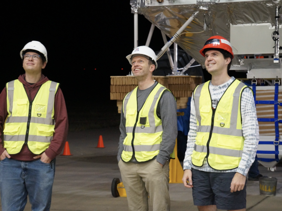 UArizona members waiting during one of nine launch attempts. Left to right: Dr. Ian Lowe, Dr. Dan Marrone, Evan Mayer. PC: Susie Zukosky (UIUC)