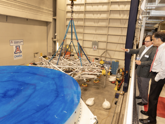 On his first full day on campus, new University of Arizona President Garimella explored the Richard F. Caris Mirror Lab with Buell Jannuzi, head of the Department of Astronomy and director of Steward Observatory.