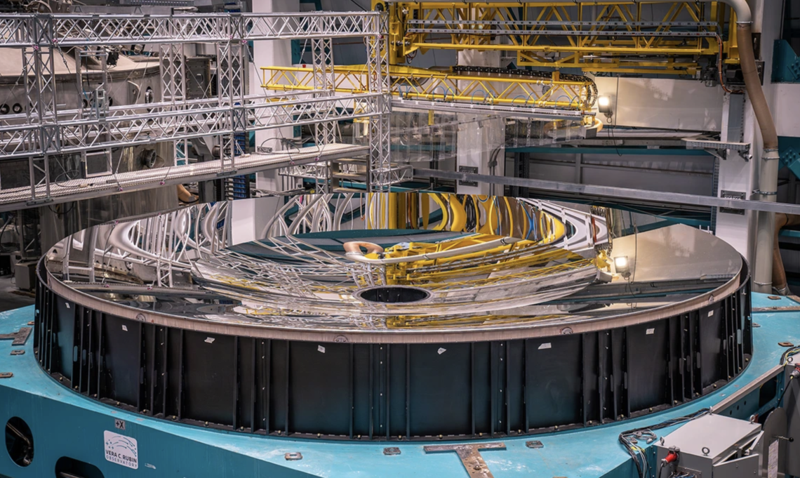 The finished mirror for the Vera C. Rubin Observatory's telescope after arriving on site in Chile. Fabricated by the University of Arizona Richard F. Caris Mirror Lab, the mirror spans 27 feet in diameter and acts both as the observatory's primary and tertiary light-collecting surface in one piece, a groundbreaking design approach.