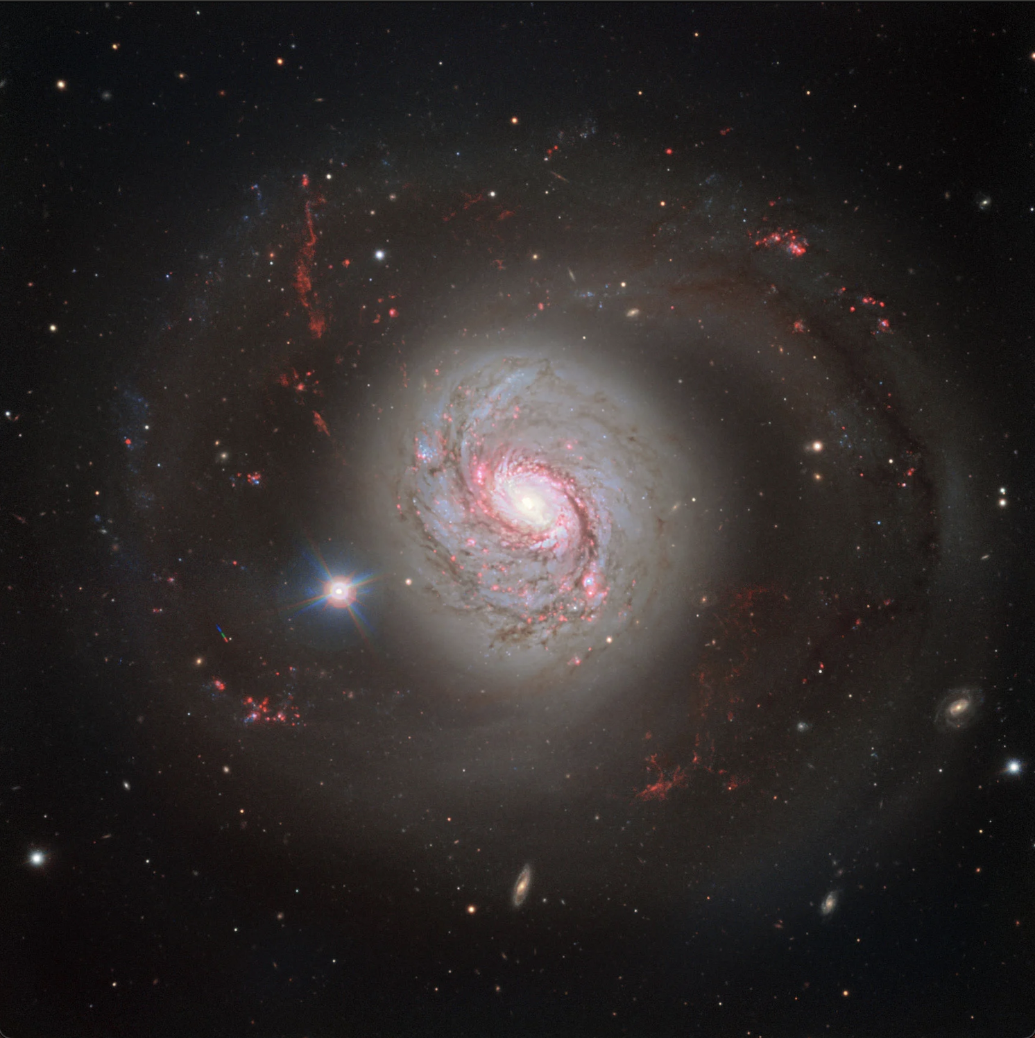 An image of the spiral galaxy NGC 1068 obtained by the European Southern Observatory’s (ESO) Very Large Telescope (VLT). The galaxy is located 14.4 Mpc (47 million light-years) away and is one of the nearest galaxies with an active galactic nucleus.