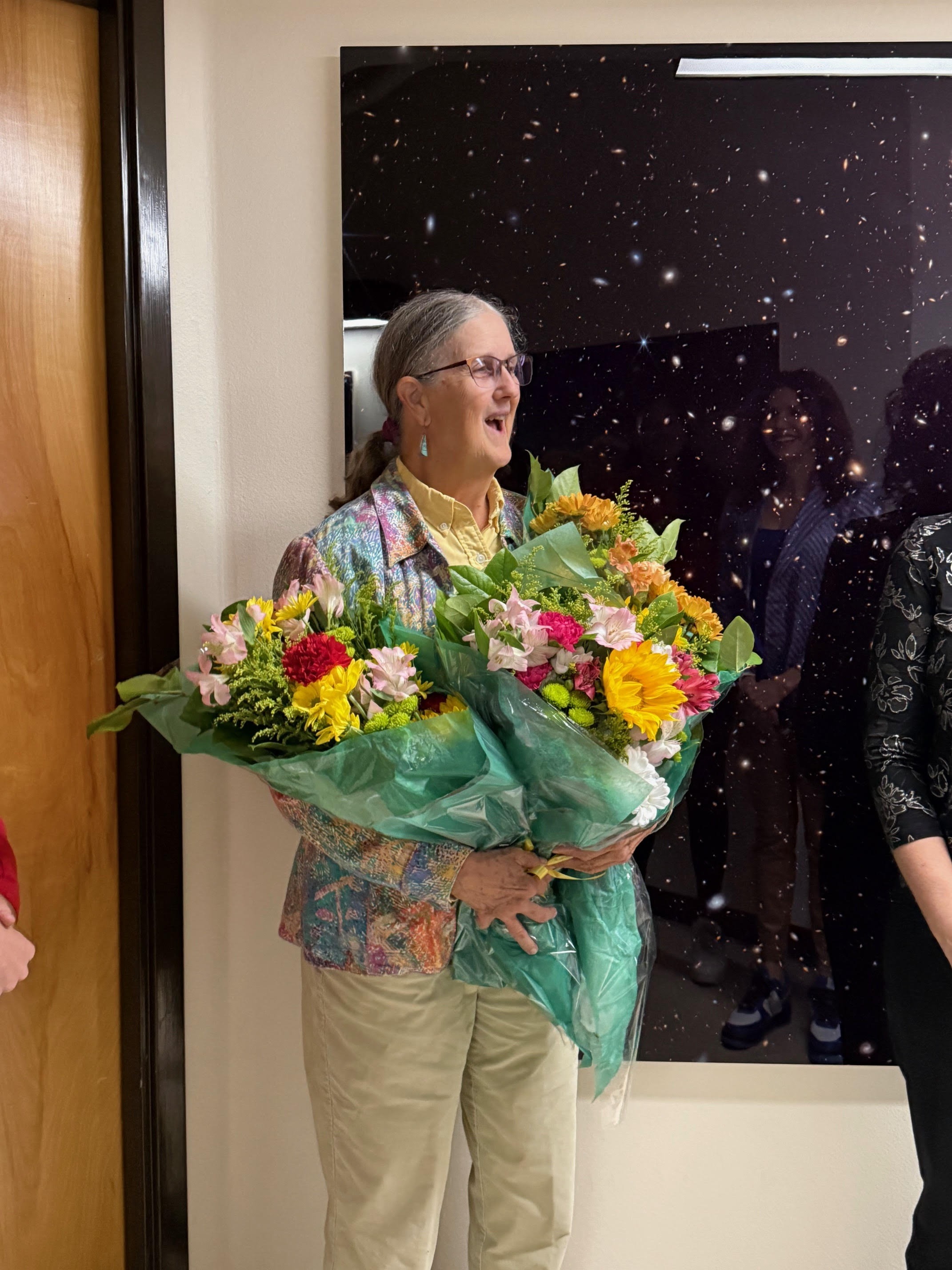 Marcia Rieke receives flowers for her Big 12 award