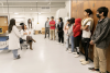 Tutees for the MESCIT program tour the lab of Cherie De Vore (seated at left), an assistant professor in the Department of Chemical and Environmental Engineering. MESCIT provides one-on-one math tutoring to local Native American middle and high school students, and brings them to campus for tours and to connect with U of A scientists and engineers from Native backgrounds.