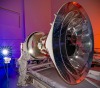 NASA’s SPHEREx observatory is oriented in a horizontal position, revealing all three layers of photon shields as well as the telescope. This photo was taken at BAE Systems in Boulder, Colorado, in April 2024. NASA/JPL-Caltech/BAE Systems