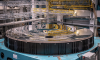 The finished mirror for the Vera C. Rubin Observatory's telescope after arriving on site in Chile. Fabricated by the University of Arizona Richard F. Caris Mirror Lab, the mirror spans 27 feet in diameter and acts both as the observatory's primary and tertiary light-collecting surface in one piece, a groundbreaking design approach.